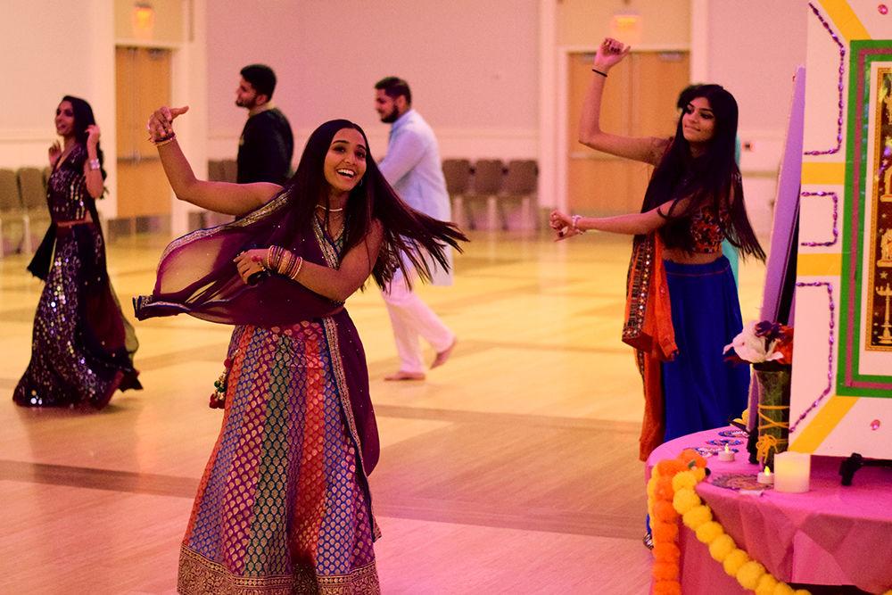 Students dance as part of Garba celebrations in the Talley Ballroom on Saturday evening, October 19, 2019. Garba is dance form with origins in the state of Gujarat in India performed centrally around a picture of Goddess Shakti.