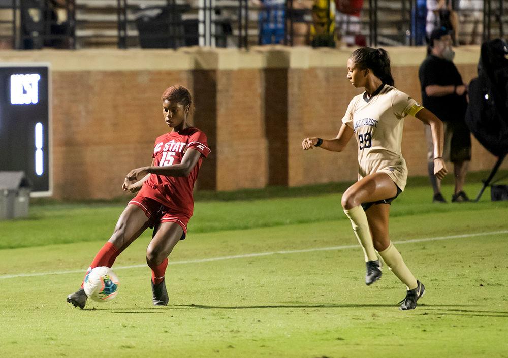 Freshman forward Jameese Joseph attempting to lose a defender versus Wake Forest during the match on Sunday, Sept. 29, 2019 at W. Dennie Spry Soccer Stadium. Joseph finished the game with two shots and NC State and Wake Forest tied 1-1.