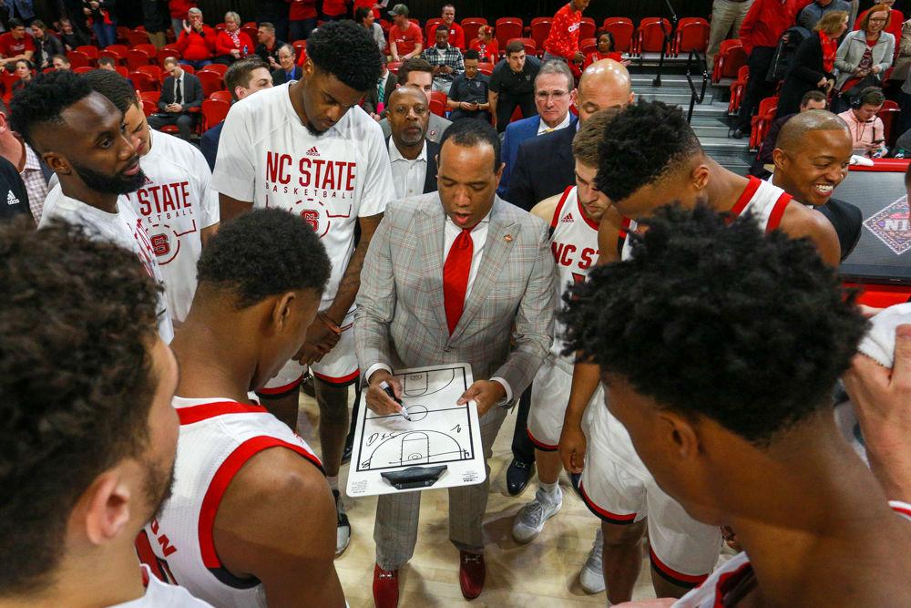 Head coach Kevin Keatts talks strategy with his team prior to the 84-78 win over Hofstra in the first round of the NIT on Tuesday, March 19, in Reynolds Coliseum.