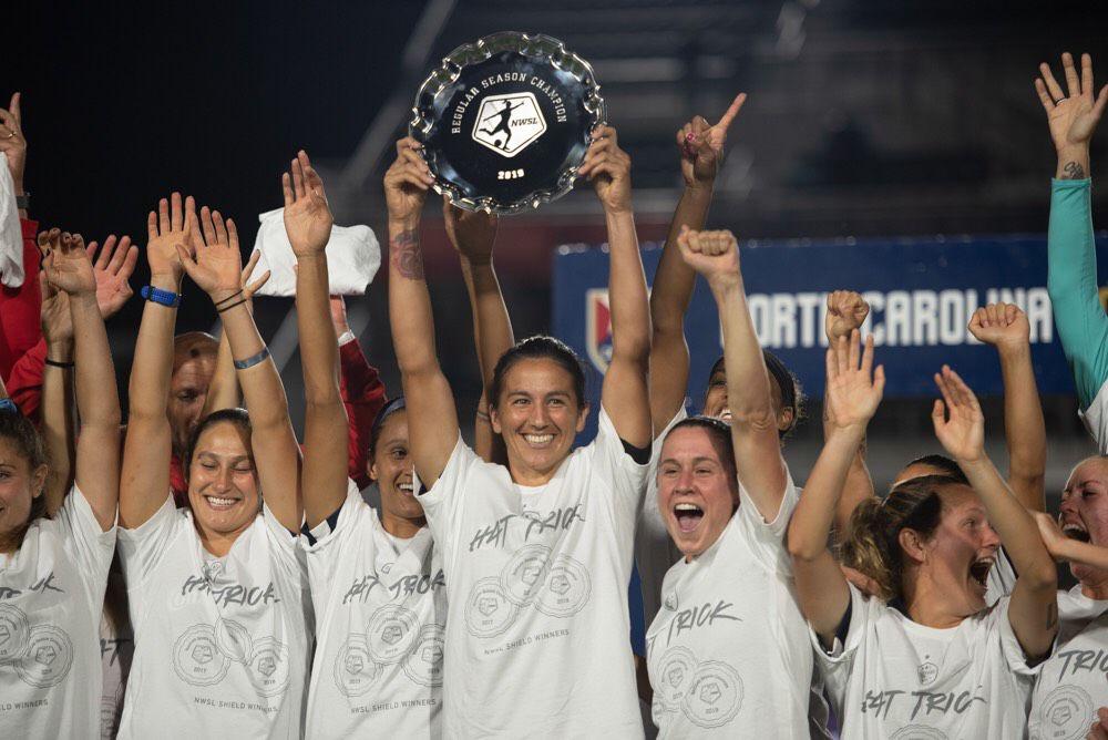NC Courage defender and captain Abby Erceg lifts the NWSL Shield after her team's 3-2 win over Sky Blue FC. The Courage have one the shield in each of the last three seasons.