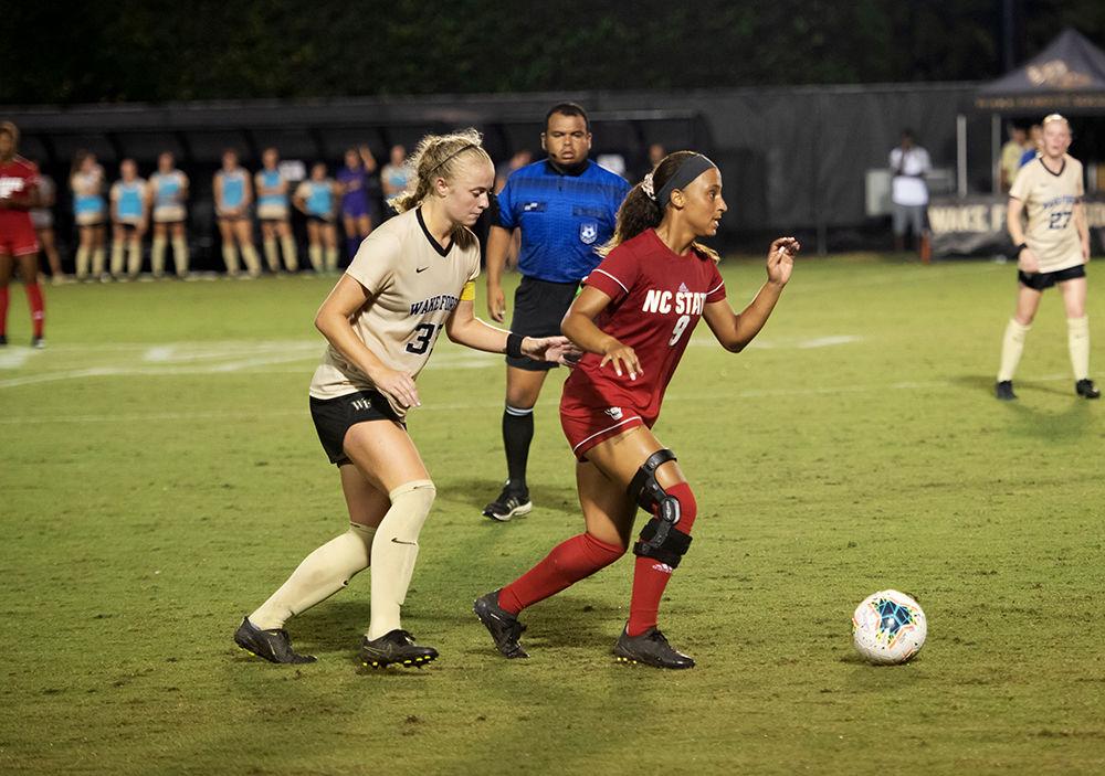 Senior forward Maxine Blackwood pushing the ball upfield during the NC State versus Wake Forest match on Sunday, Sept. 29, 2019 at W. Dennie Spry Soccer Stadium. Wake Forest and NC State tied 1-1.