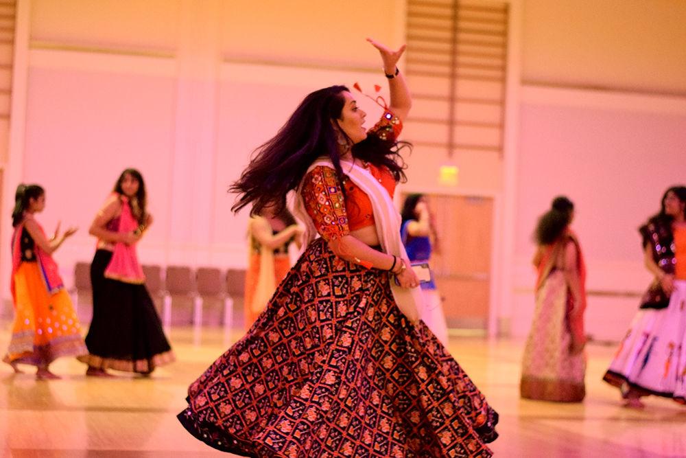 Disha Patel, a senior studying Biological Sciences dances as part of Garba celebrations in the Talley Ballroom on Saturday evening, October 19, 2019. Garba is dance form with origins in the state of Gujarat in India performed centrally around a picture of Goddess Shakti.