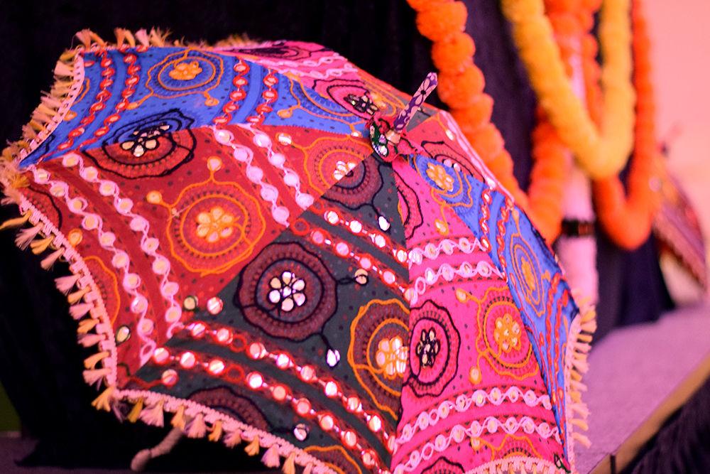 A decorated umbrella is showcased during Garba celebrations in Talley Ballroom on Saturday evening, October 19, 2019. Garba is dance form with origins in the state of Gujarat in India performed centrally around a picture of Goddess Shakti.