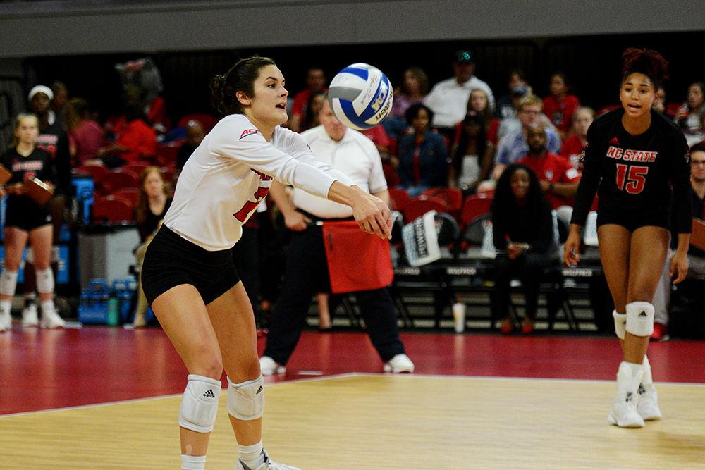 Senior defensive specialist and libero Grace Irvin digs the ball against Virginia Tech on October 4 in Reynolds Coliseum. Irvin played in five sets with 14 assists, 31 digs, and one ace in the 3-2 win over Virginia Tech.