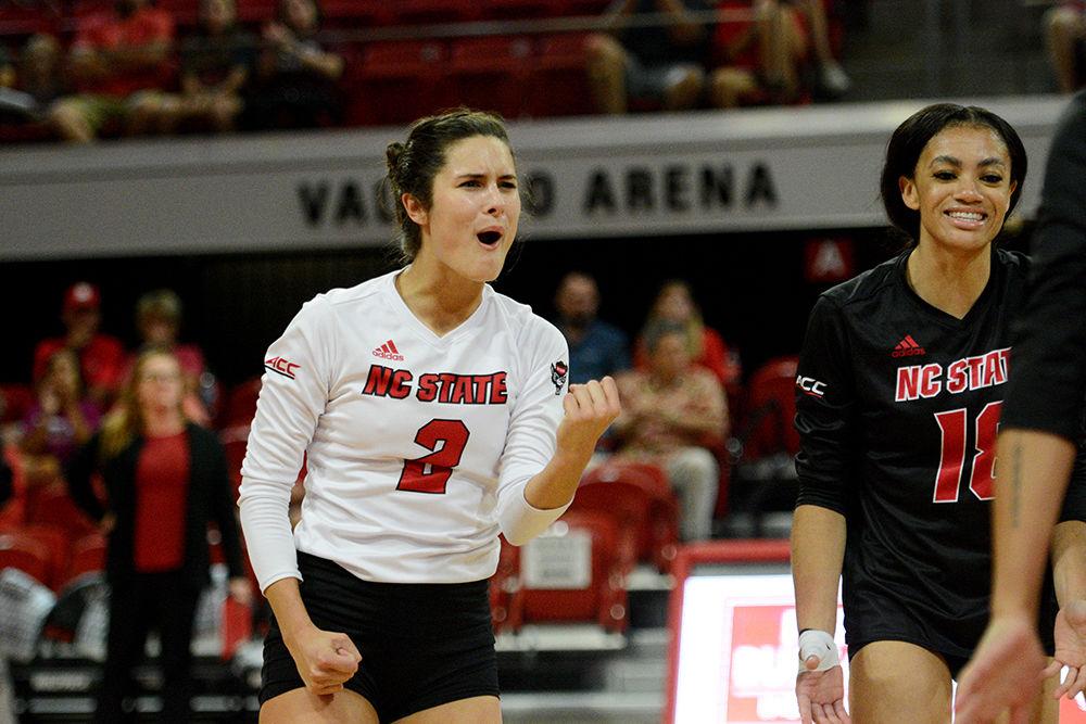 Senior defensive specialist and libero Grace Irvin celebrates after a point against Virginia Tech on October 4 in Reynolds Coliseum. Irvin played in five sets with 14 assists, 31 digs, and one ace in the 3-2 win over Virginia Tech.