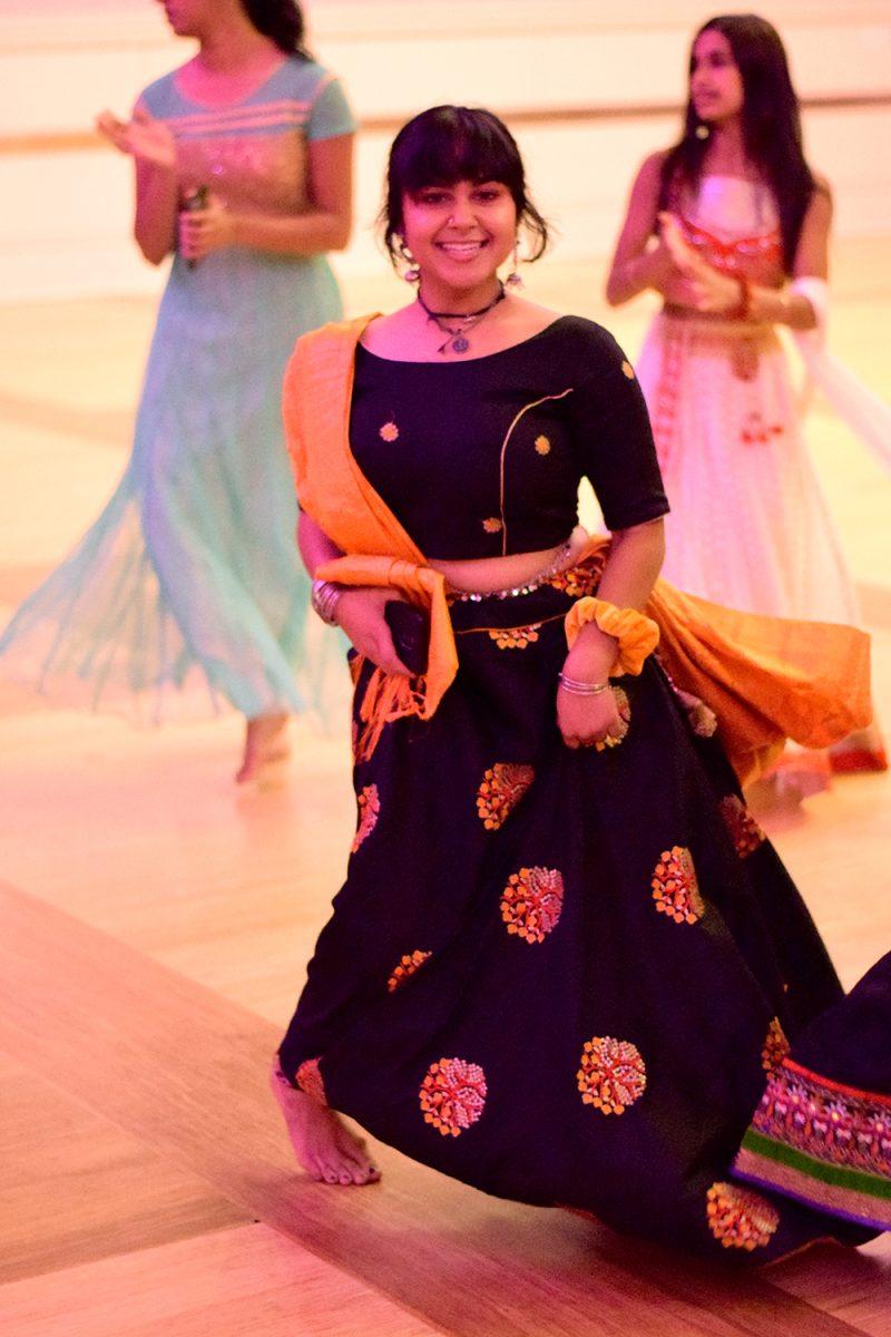 Jessika Patel, a senior studying Elementary Education dances as part of Garba celebrations in the Talley Ballroom on Saturday evening, October 19, 2019. Garba is dance form with origins in the state of Gujarat in India performed centrally around a picture of Goddess Shakti.