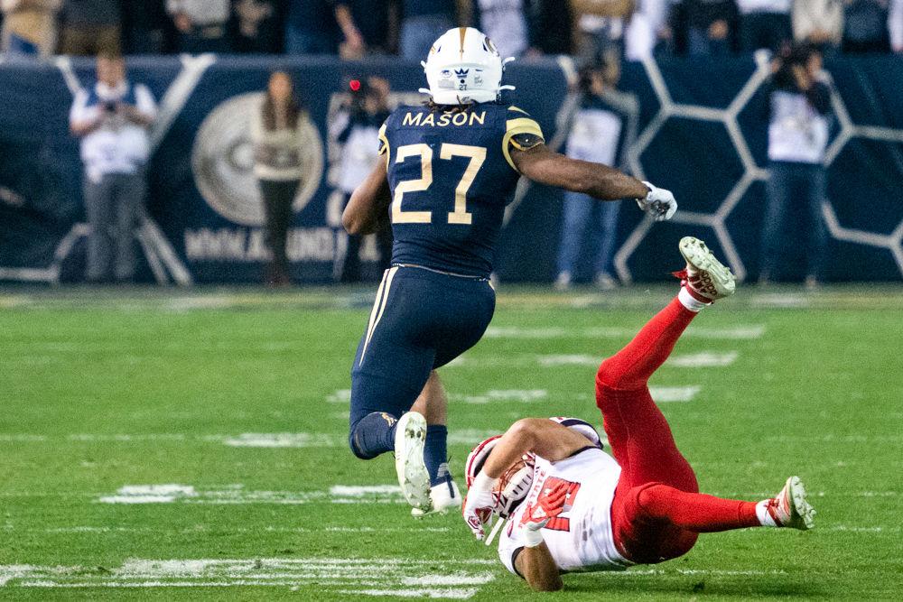 NC State sophomore safety Tanner Ingle misses a tackle during NC State's game against Georgia Tech at Bobby Dodd Stadium on Nov. 22, 2019. The Wolfpack lost, 28-26.