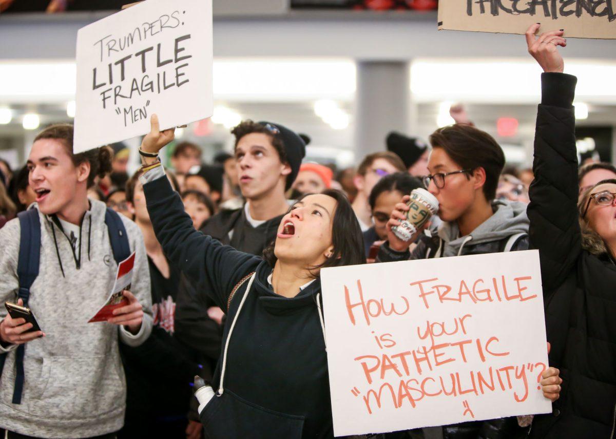 Ginna Solorzano, a graduate student studying Sociology, chants during the No Hate At NC State protest of a Turning Point event in Talley Student Center on Wednesday, Nov. 13, 2019. "I am out here today because it is vile that NC State allows an outright antagonist to speak here," she said. "The cops are here protecting them, not us. It's a contradiction of NC State's values."
