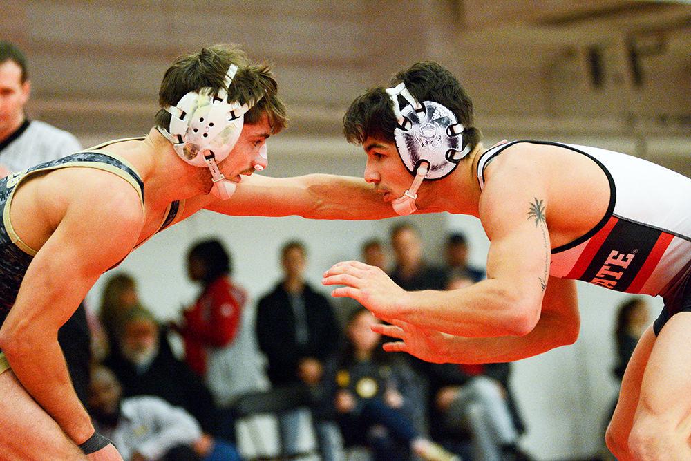 Jarrett Trombley, a Redshirt freshman, wrestles in the 133 weight class during the match against UNC Pembroke on Saturday, Nov. 16, 2019. He went 20-6 in six open tournaments during the 2018-19 season.