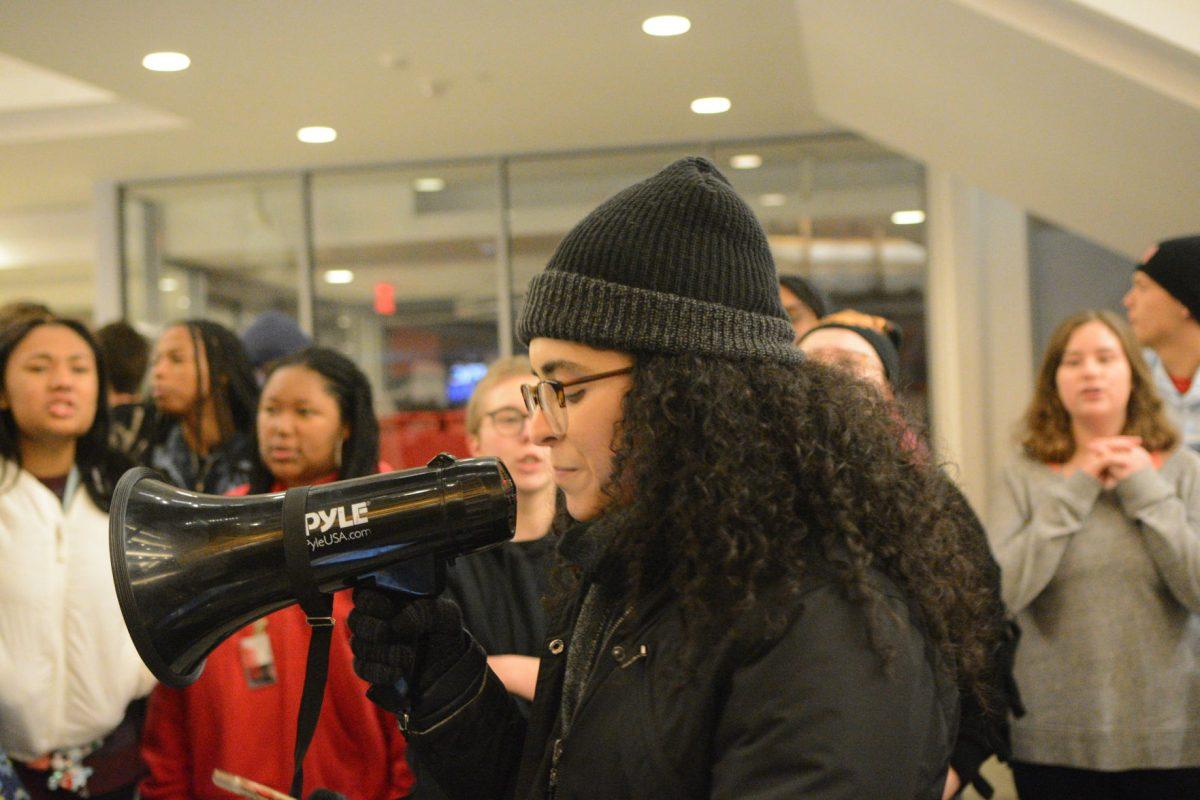 Victoria Gerson, a grad student majoring in graphic design, reads a profound poem about losing our chains during the No Hate at NC State Protest on Wednesday, Nov. 13, 2019. The No Hate at NC State protest was protesting the Turning Point U.S.A. Culture War event.