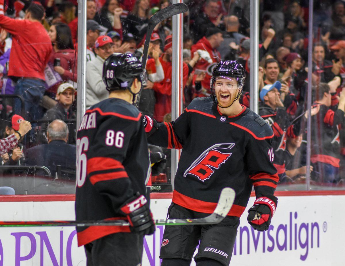 Carolina Hurricanes defenseman Dougie Hamilton goes to hug right wing Teuvo Teravainen after Hamilton's goal in the second period during the game versus the Florida Panthers on Saturday, Nov. 23, 2019 in PNC Arena. Hamilton's goal against the Panthers means the defenseman has scored 10 goals this season. The Canes beat the Panthers 4-2.