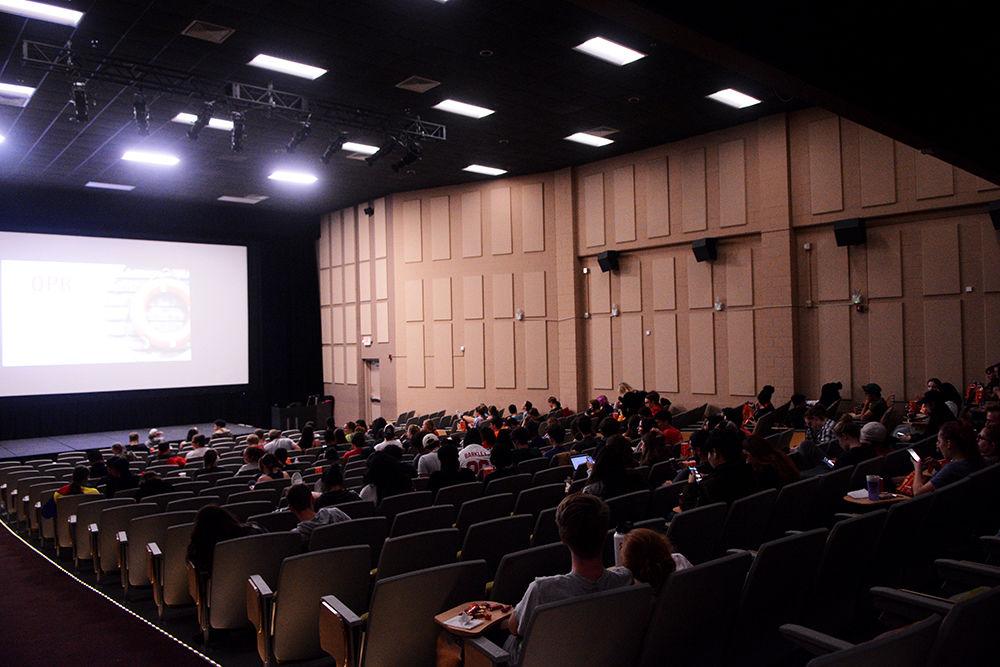 More and more people begin to arrive in the theater to wait for the movie to begin during Scream on the Green on Thursday, Oct. 31, 2019. Scream on the Green is an annual event hosted by the UAB that involves snacks, drinks, and a scary movie. This year's movie was "Scary Stories To Tell In The Dark."