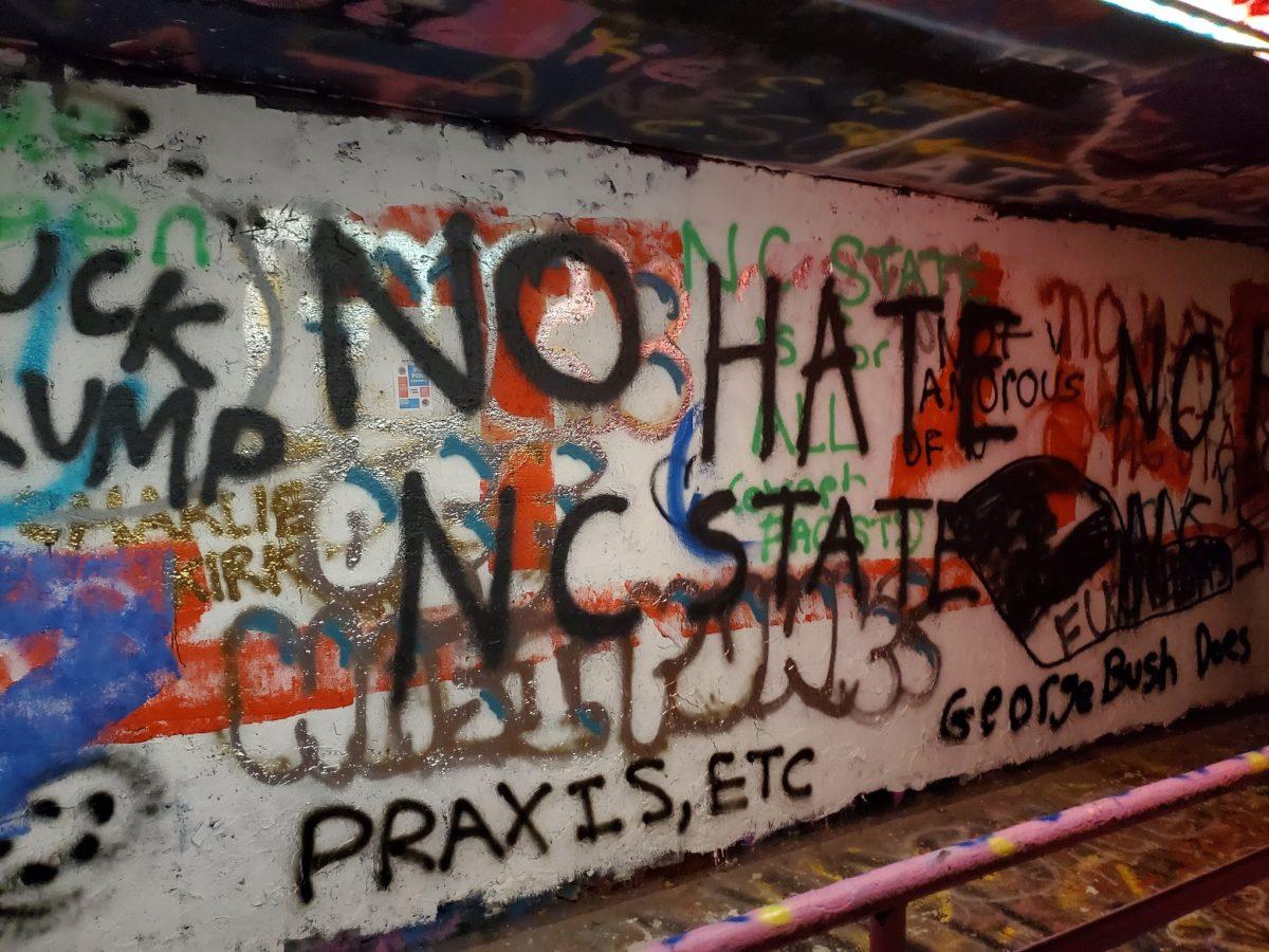 The words "No Hate NC State" are spray painted in the Free Expression Tunnel on Nov. 13, 2019, the same day as Turning Point USA's Culture War event featuring Lara Trump and Charlie Kirk.