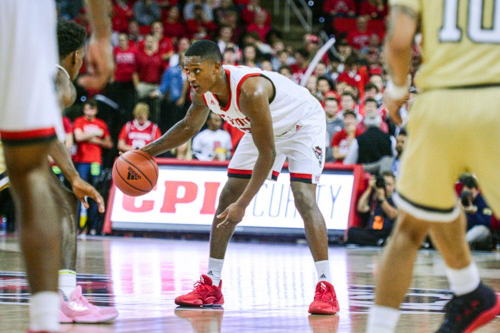 Redshirt senior guard, C.J. Bryce dribbles at the top of the key in PNC Arena on November 5. Bryce played 44 minutes, scored 24 points, had 11 rebounds and two assists in the Wolfpack&#8217;s 82-81 overtime loss against Georgia Tech.