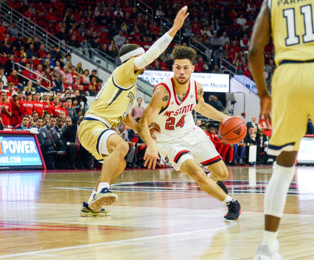 Redshirt junior guard, Devon Daniels drives to the basket in PNC Arena on November 5, 2019. Daniels played in 34 minutes and scored 12 points, had three steals, five assists and three rebounds in the Wolfpacks 82-81 overtime loss to Georgia Tech.