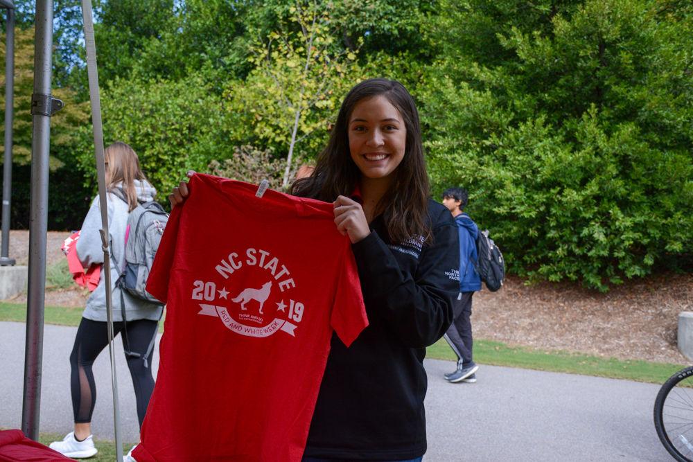 Hosted by the Office of Development Communications and Stewardship and the Alumni Association, Pack Appreciation Day gave students the opportunity to send thank you notes and videos to donors, receive NC State swag, and enjoy Tenco Coffee and Howling Cow ice cream. Third year Carli Patterson came out with the Student Alumni Association to hand out T-shirts. Pack Appreciation Day took place on Monday, Nov. 4, 2019 at Stafford Commons.
