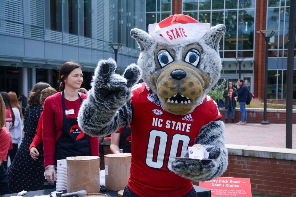 Mr. Wuf came out to enjoy a scoop of Howling Cow's new ice cream flavor, Coco Choco Cafe, during NC State's Pack Appreciation Day event. The new flavor and Provost's Pick includes a coffee ice cream base with chocolate chunks, caramel, and coconut flakes. Pack Appreciation Day took place on Monday, Nov. 4, 2019 at Stafford Commons.
