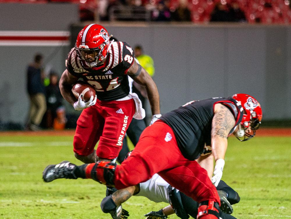 Freshman running back Zonovan Knight rushes versus Louisville on Saturday, Nov. 16, 2019 at Carter-Finley stadium. Knight had 61 rushing yards in the 34-20 loss.