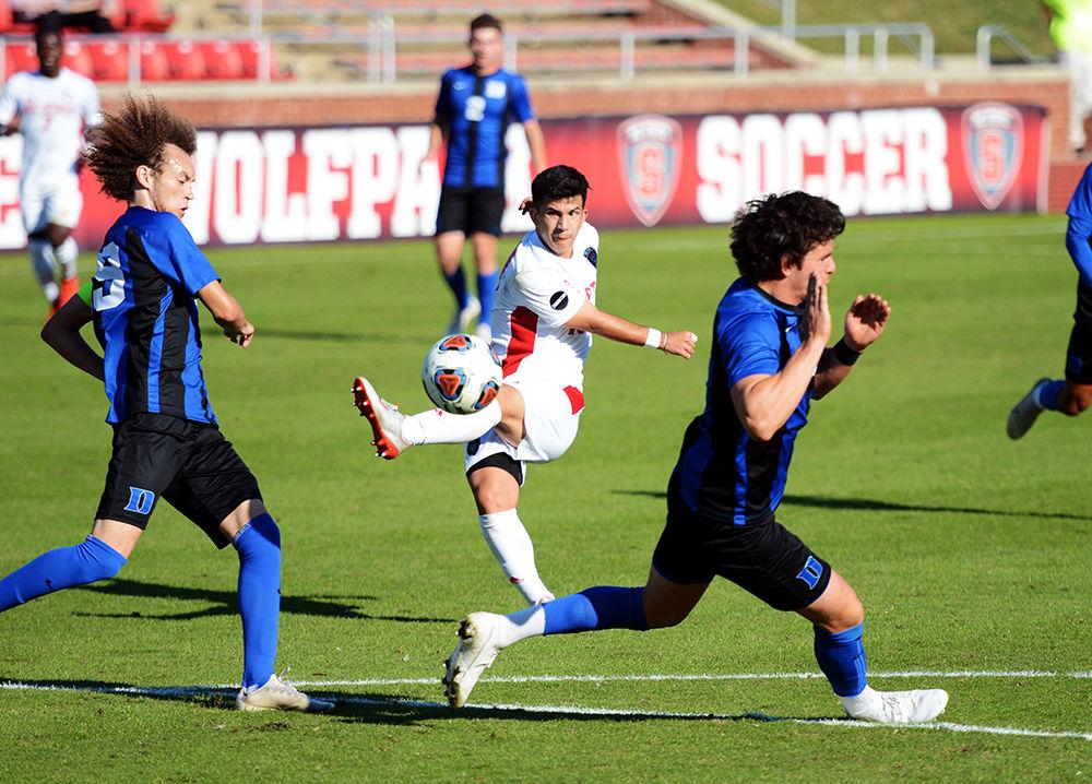 Junior middle fielder, David Loera takes a shot on the goal in Dail Soccer Field on November 6, 2019. Loera had four shots, three shots on the goal and one assist in the Wolfpack&#8217;s 2-1 victory over the Duke Blue Devils. The wolfpack will advance to the second round of the ACC tournament.