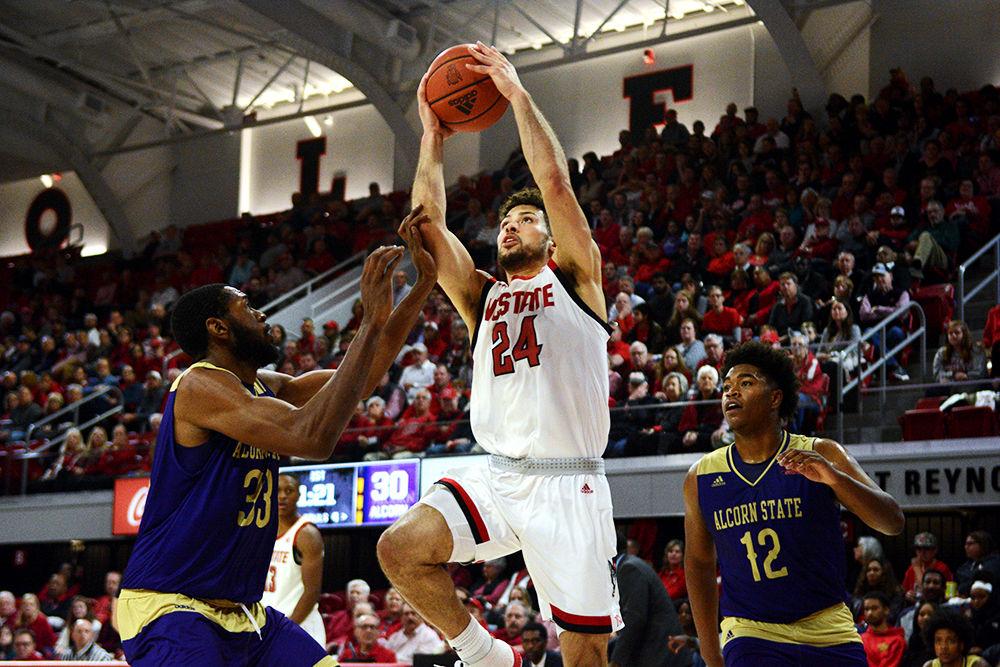 Senior guard Devon Daniels goes up for a shot against Alcorn State at Reynolds Coliseum Tuesday, Nov. 19, 2019. The Wolfpack beat the Braves 87-64.