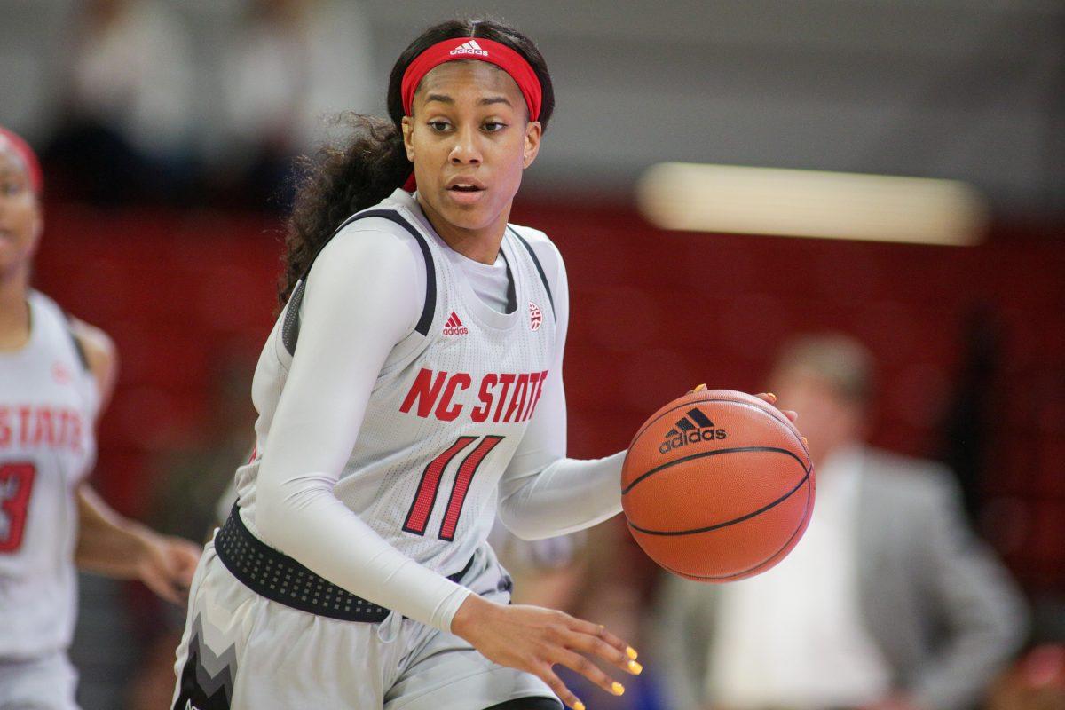 Freshman wing Jakia Brown-Turner brings the ball up the court. Brown-Turner had 14 points in her debut in the 80-44 victory over NC A&amp;T on Wednesday, Nov. 6, 2019 in Reynolds Coliseum.