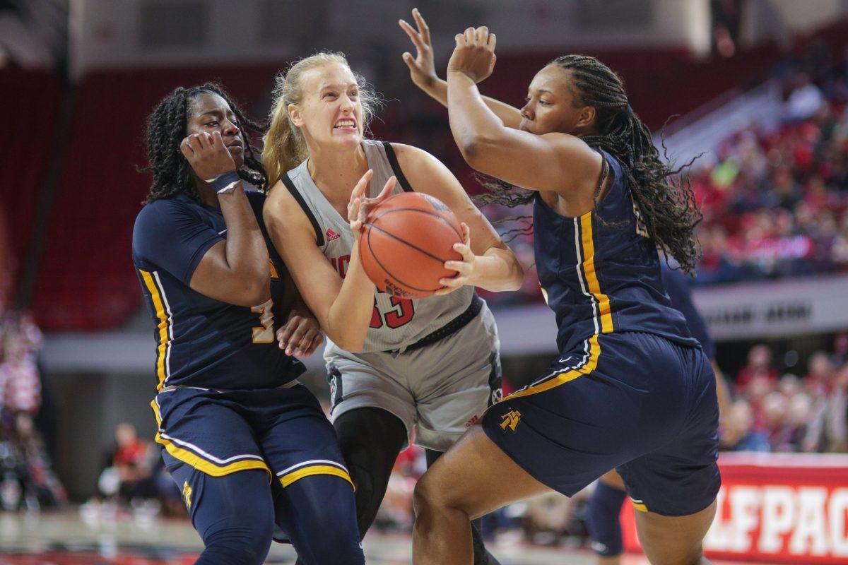 Sophomore center Elissa Cunane is fouled as she drives to the paint during the 80-44 win over NC A&amp;T on Wednesday, Nov. 6, 2019 in Reynolds Coliseum.