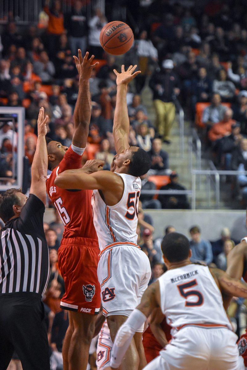 Redshirt freshman forward Manny Bates goes up for the tipoff against Auburn on Thursday, Dec. 19, 2019 at Auburn Arena in Alabama. Bates went 2-3 from the field and totaled 5 points in the 79-73 loss to the Tigers.