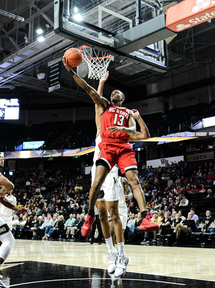 Redshirt senior guard C.J. Bryce attacks the rim against Wake Forest on Saturday, Dec. 7 at Lawrence Joel Veterans Memorial Coliseum. Bryce recorded 18 points and seven rebounds as the Wolfpack won 91-82.