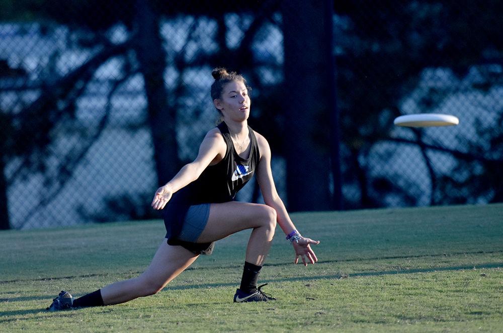 X passes the frisbee on Tuesday, September 24, 2019 at Method Community Park during the women's ultimate frisbee practice.
