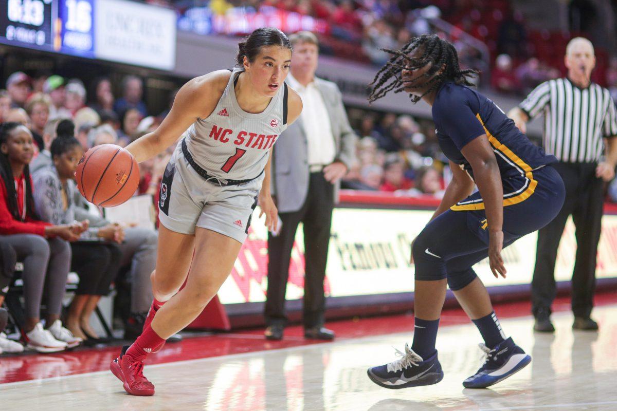 Senior guard Aislinn Konig drives toward the paint during the 80-44 win over NC A&amp;T on Wednesday, Nov. 6, 2019 in Reynolds Coliseum.