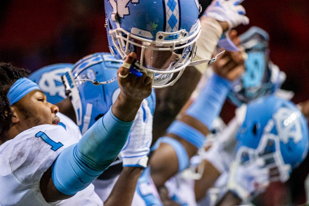 UNC players taunt NC State fans after an interception on Saturday, Nov. 13, 2019 at Carter-Finley Stadium. UNC beat NC State at home in a pitiful 44-10 effort from State.