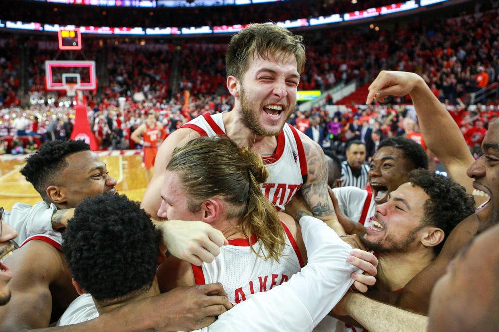 The team lifts sophomore guard Braxton Beverly into the air after Beverly's buzzer-beating 3-pointer to beat Clemson 69-67 on Saturday, Jan. 26 in PNC Arena. Beverly had 12 points and a team-high five assists in the tightly fought battle.