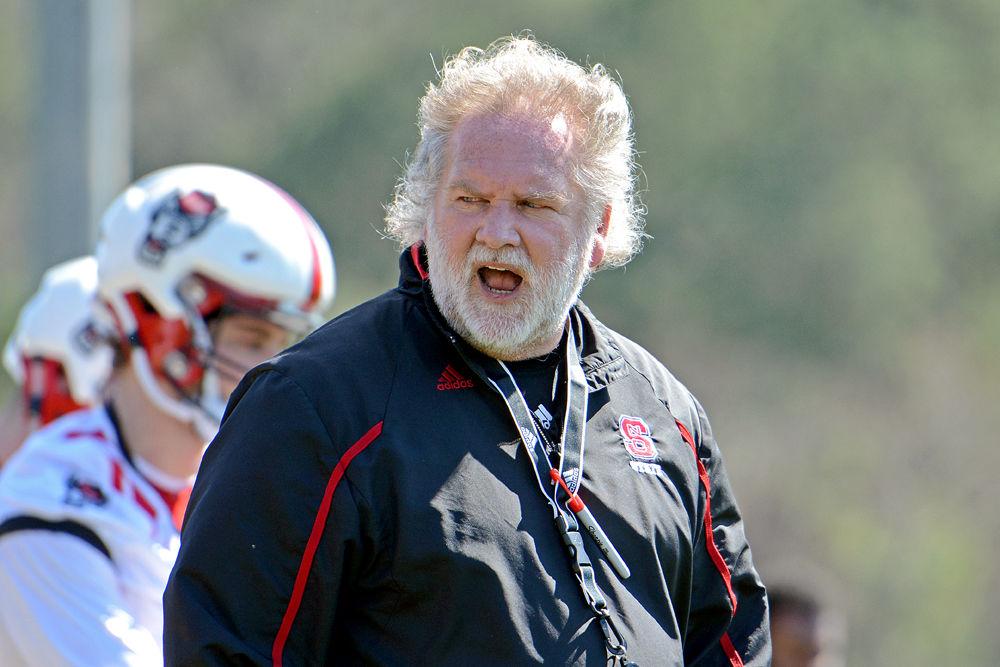 Defensive coordinator/linebackers coach Dave Huxtable yells at spring practice on Saturday, March 2, 2019 at NC State Football&#8217;s outdoor practice fields.