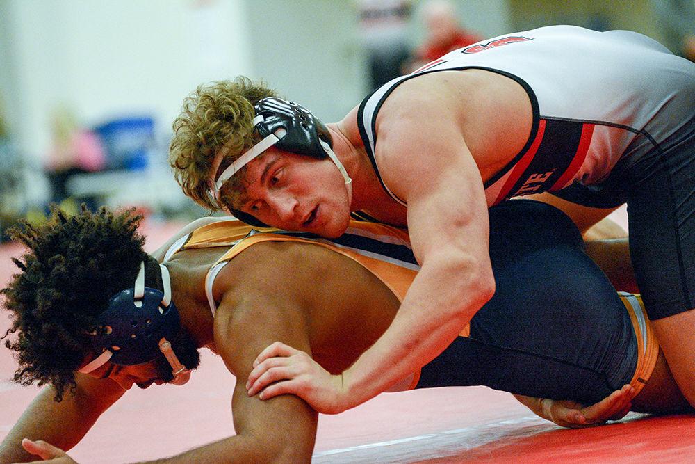 Trent Hidlay, a redshirt freshman, wrestles in the 184 weight class during the match against Reinhardt on Saturday, Nov. 16, 2019. He won a bronze medal at the 2019 Junior World Championship in Estonia in August.