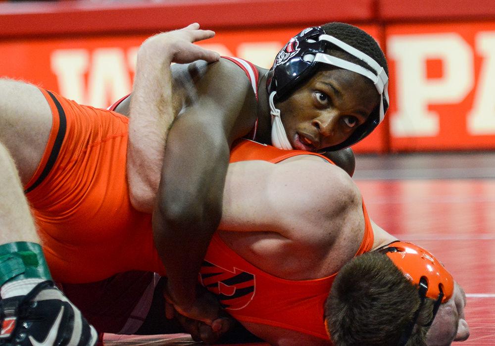 Tariq Wilson, a Redshirt Junior, looks to the coaches while keeping his opponent down during the match against the Princeton Tigers on Saturday, Jan. 11, 2020. In the 18-19 season he went 17-5, 8-2 in duals. and a perfect 10-0 in bonus point matches.