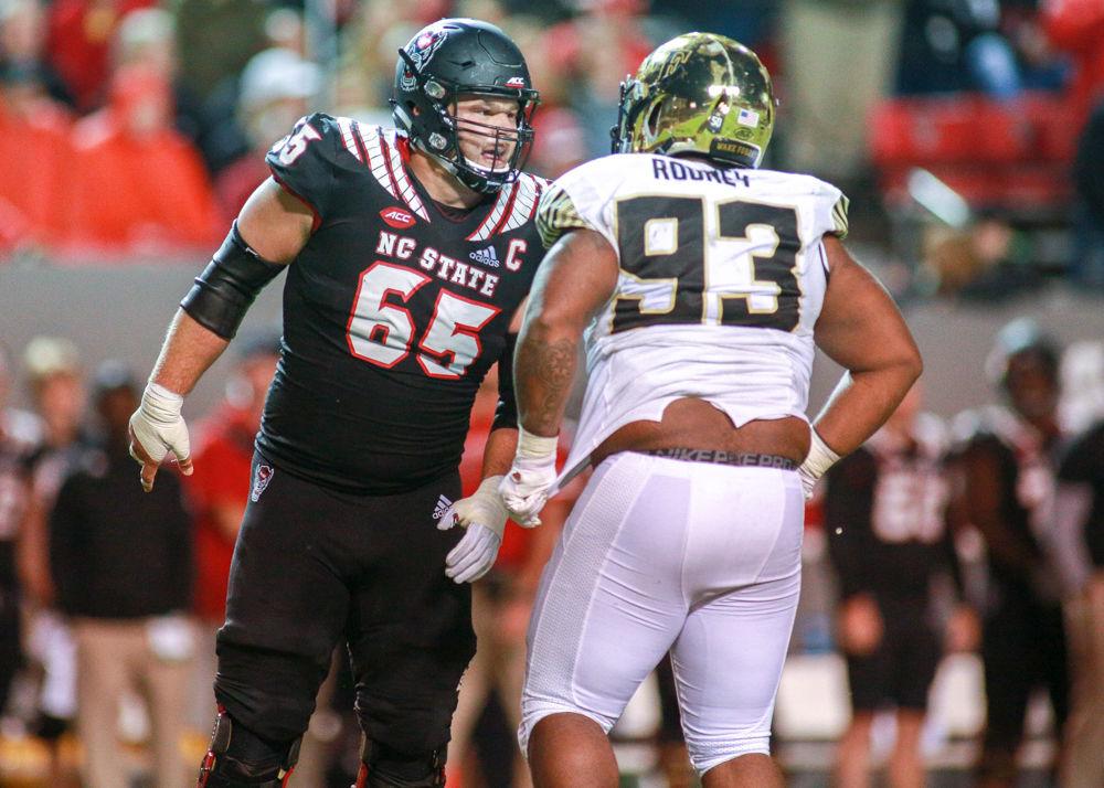 Graduate center Garrett Bradbury yells at Wake Forest defensive tackle Zeek Rodney during the 27-23 loss to the Demon Deacons on Thursday, Nov. 8 in Carter-Finley Stadium.