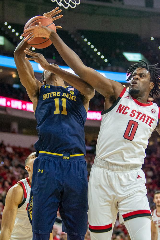 Redshirt junior forward DJ Funderburk shuts down a Notre Dame layup attempt on Wednesday, Jan. 8, 2020 in PNC Arena. Funderburk scored 16 points and had 9 rebounds against the Fighting Irish. The Wolfpack overcame a deficit at the half to beat Notre Dame 73-68.