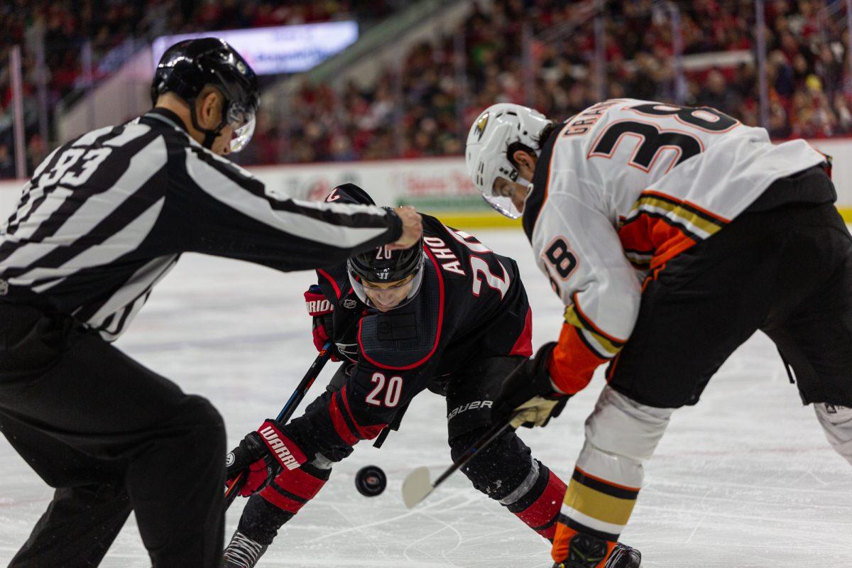 Hurricanes center Sebastian Aho faces off versus Ducks center Derek Grant on Friday, Jan. 17, 2020 at PNC Arena. The Canes lost 2-1 in overtime.