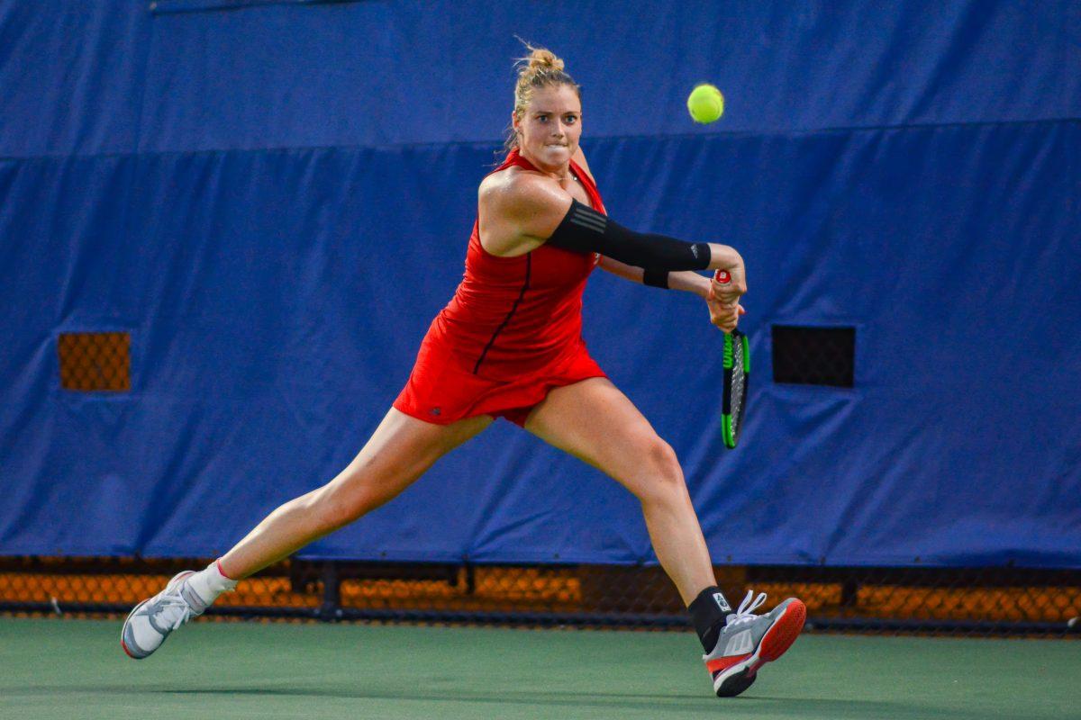 Junior Anna Rogers returns a volley against Duke on Friday, May 10, 2019 at Ambler Tennis Stadium in Durham. Rogers&#8217; match against Duke freshman Maria Mateas was halted at 7-6 (2), 0-1 during the Wolfpack&#8217;s 4-0 loss.