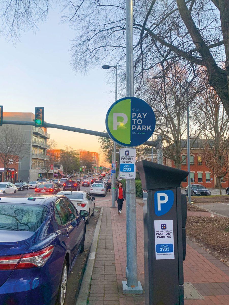 Parking meters line Hillsborough Street. Students and locals must pay to park at designated spots before 8 p.m.
