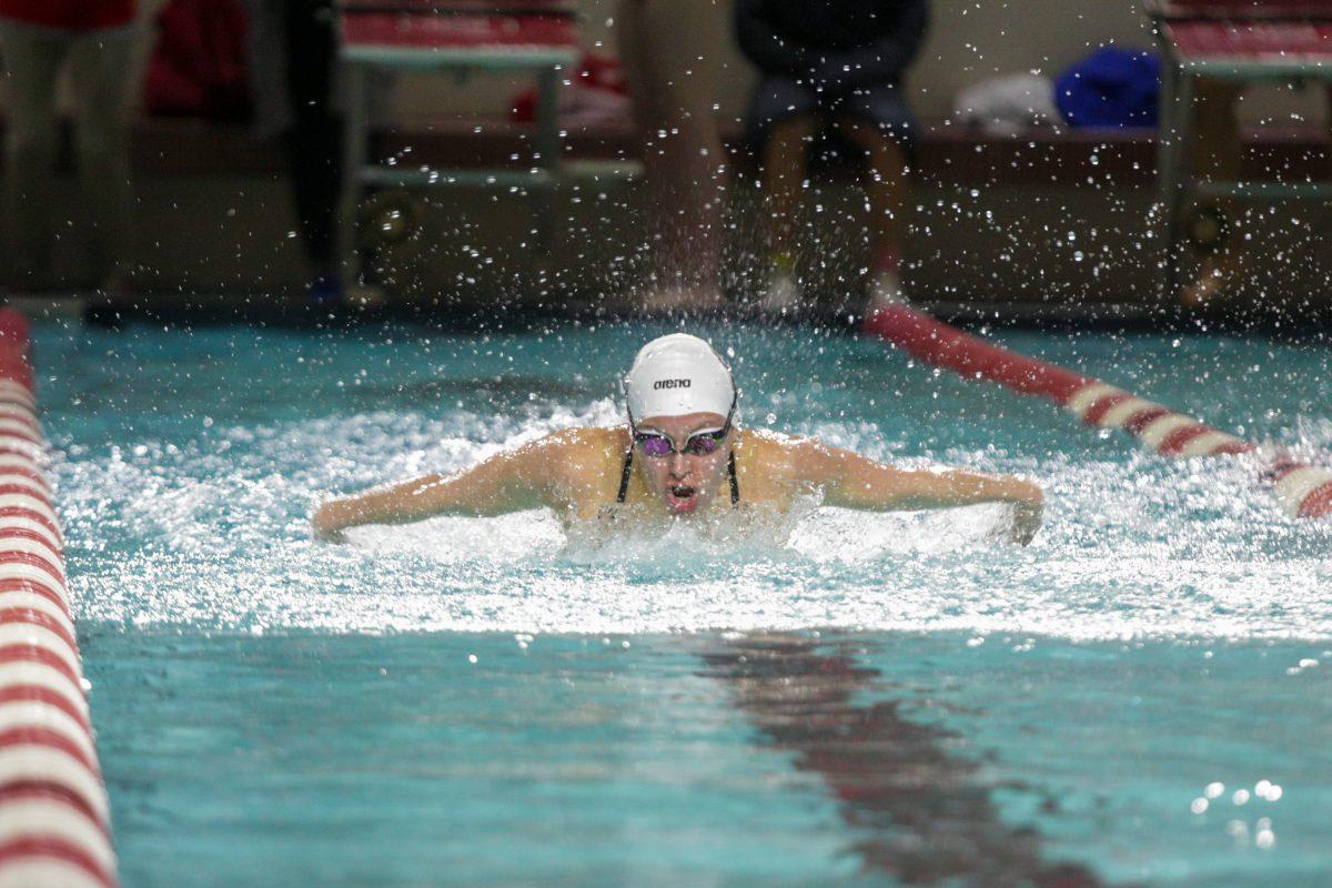 Senior Makayla Sargent swims the 200 yard butterfly. Sargent placed first with a 1:59.81 in the 181-116 rout of Duke on Saturday, Jan. 18 in Casey Aquatic Center.