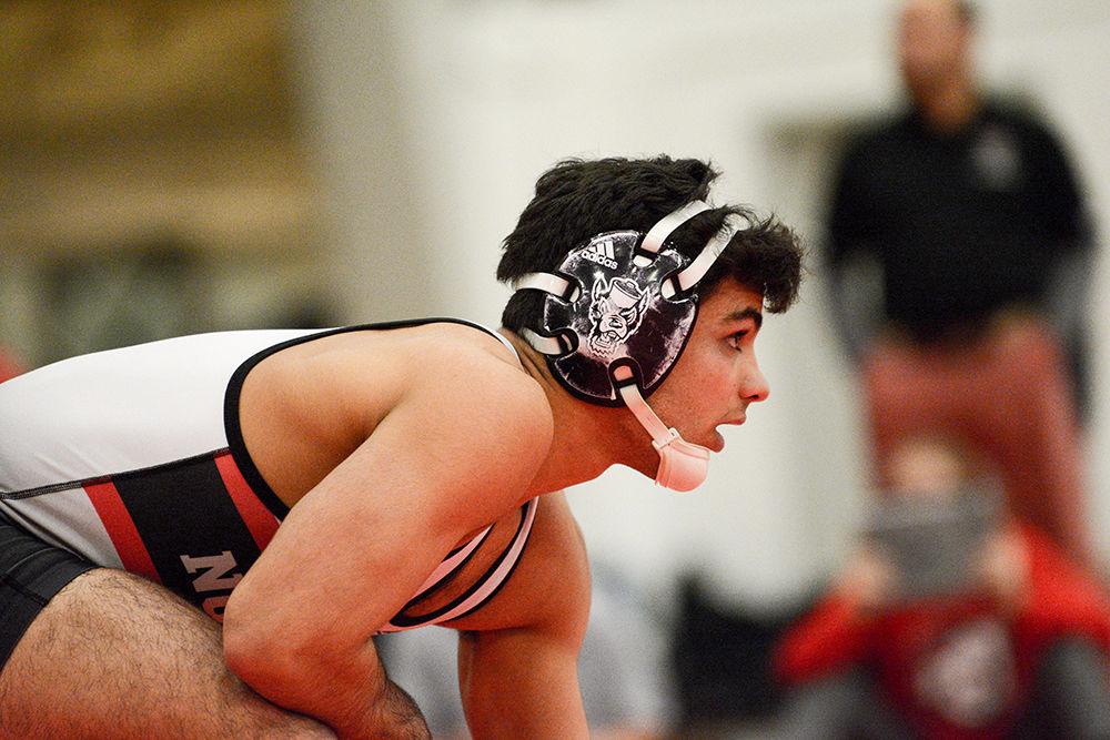 Alex Urquiza, a Redshirt freshman, wrestles in the 141 weight class during the match against Belmont Abbey on Saturday, Nov. 16, 2019. He went 22-9 at seven open tournaments during the 2018-19 season.