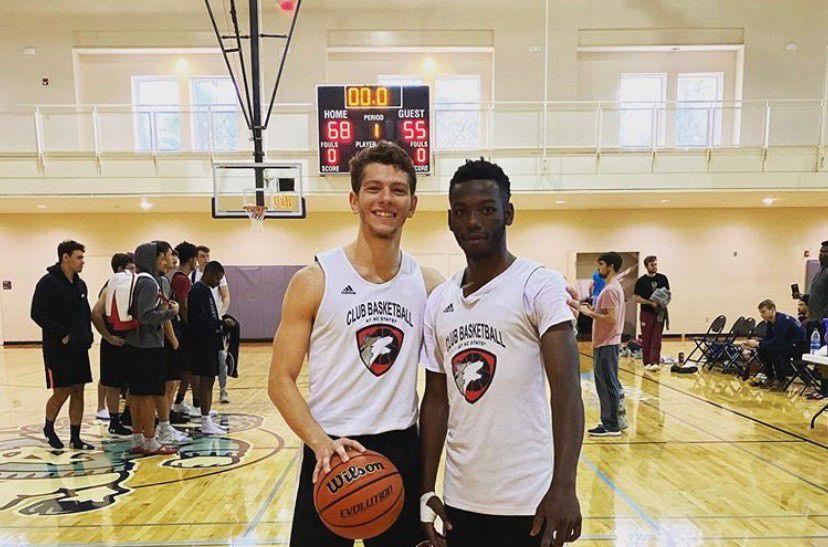 Junior guard/forward Dane Palazzo (left) poses with with teammate Cam Wimbish (right).