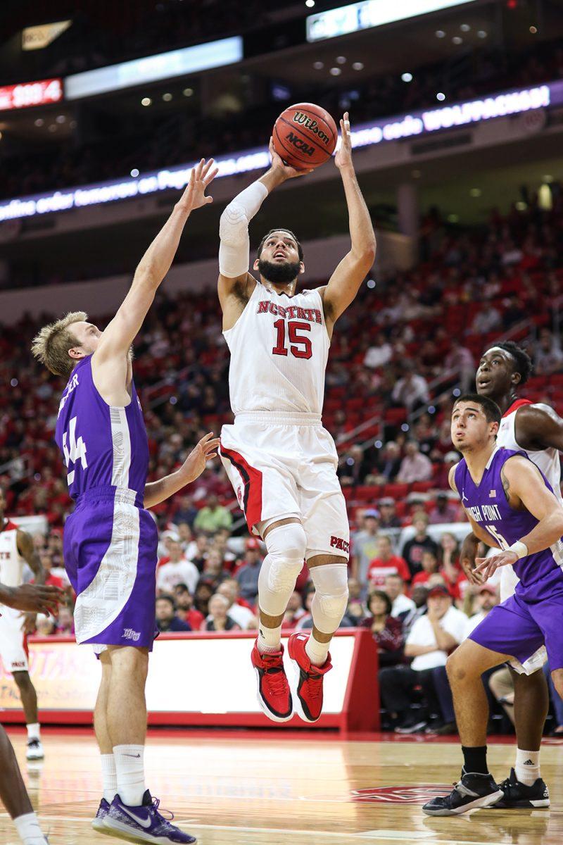 Sophomore guard Cody Martin goes up for a jumper in the 76-73 buzzer beating thriller over High Point University in PNC Arena on December 16th.