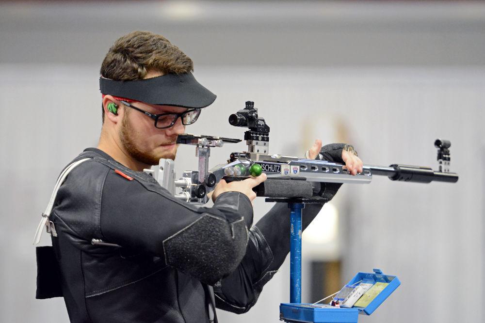 Tyler Lefebvre, a third-year studying mechanical engineering, prepares to take a shot at his target during the rifle match against No. 20 North Georgia University on Sunday, Nov. 19, 2017 at Reynolds Coliseum. The Wolfpack defeated North Georgia with an aggregate score of 4650 to 4575.