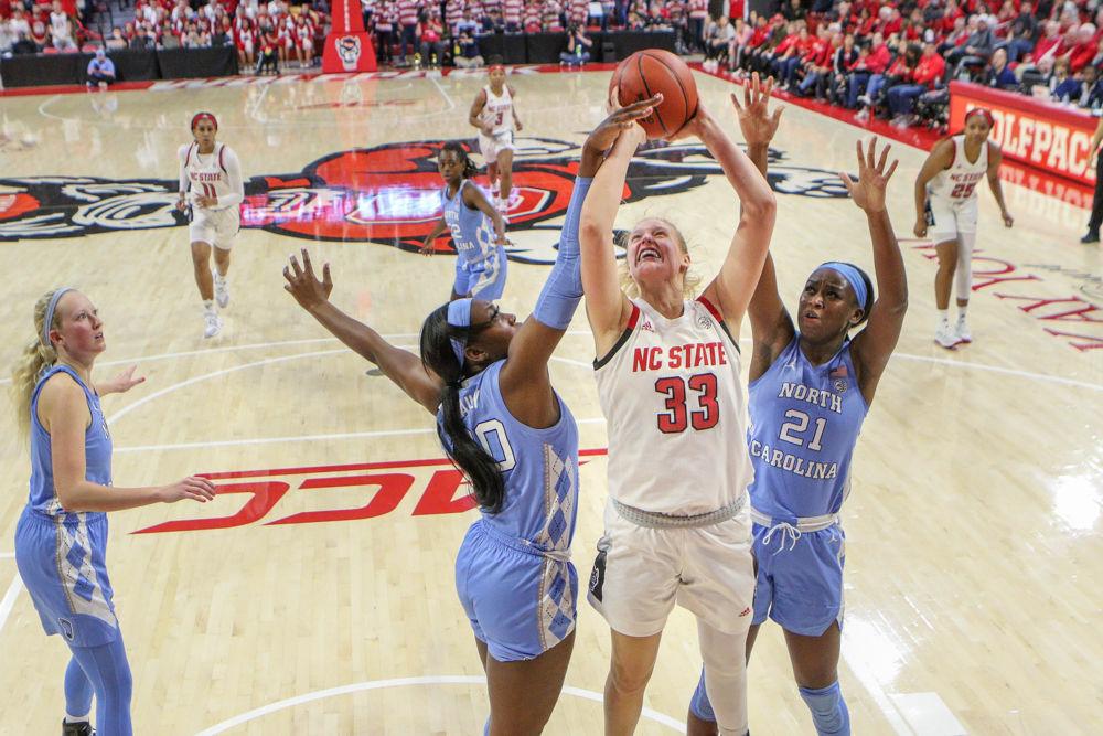 Sophomore center Elissa Cunane goes up for a shot in the paint. Cunane dominated in the paint and led the team with 22 points and 17 rebounds. The Wolfpack took down UNC 76-68 in Reynolds Coliseum on Sunday, Jan. 26.