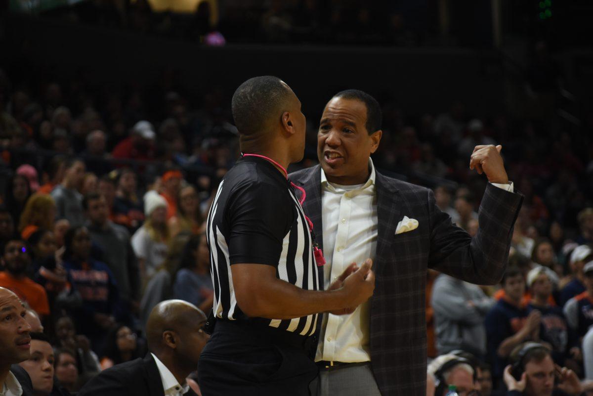 Men's basketball coach Kevin Keatts argues a call with the referee during the Wolfpack's 53-51 win over Virginia.&#160;