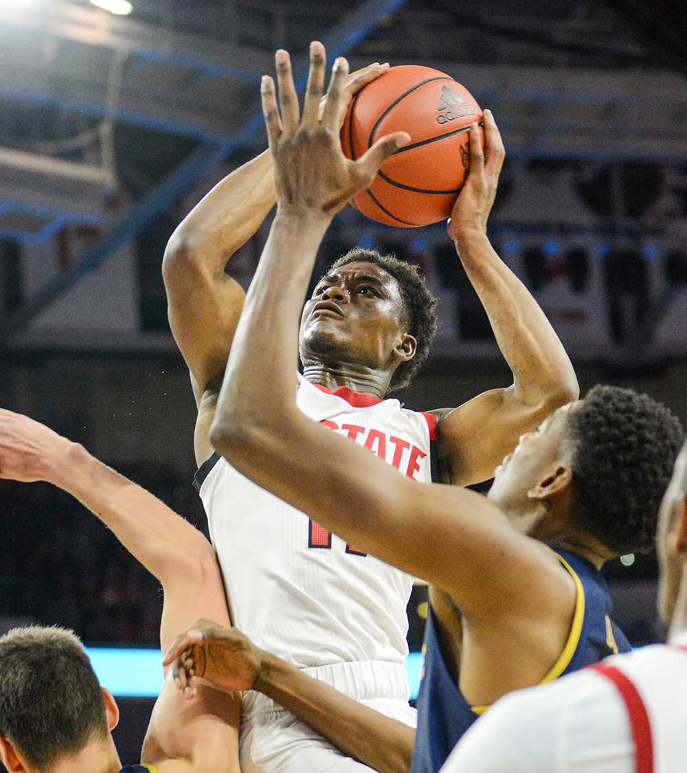 Senior guard Markell Johnson gets a quick jumpshot over the Notre Dame defense Wednesday, Jan. 8, 2020 in PNC Arena. Johnson scored 27 points and had 7 assists against the Fighting Irish. The Wolfpack overcame a deficit at halftime to beat Notre Dame 73-68.