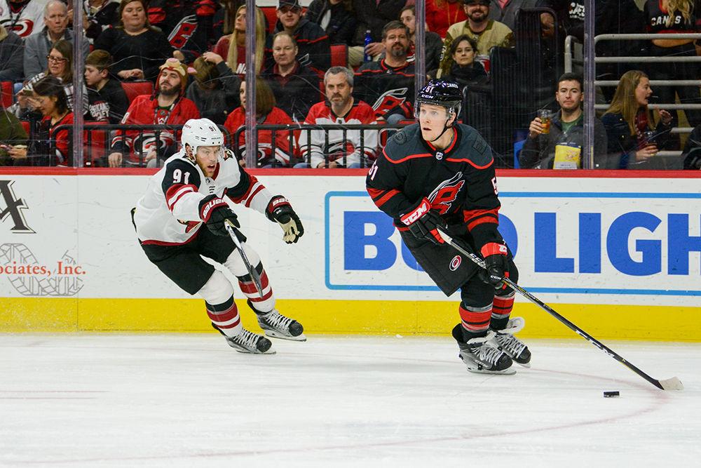 Carolina Hurricanes defenseman Jake Gardiner looks to pass the puck during the game versus the Arizona Coyotes on Friday, Jan. 10, 2020 in PNC Arena. The Hurricanes beat the Coyotes 3-0.