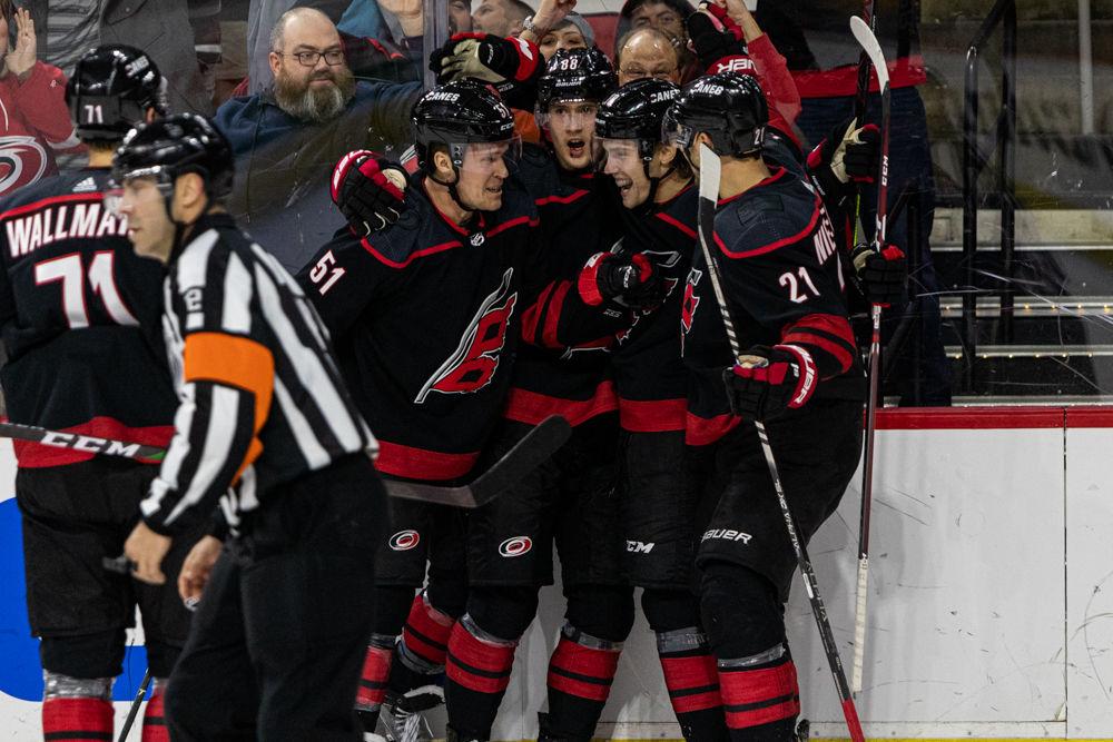 The Hurricanes celebrate with center Ryan Dzingel after a goal versus the Capitals on Tuesday, Jan. 3, 2020 at PNC Arena. Dzingel had one goal on two shots in the 4-3 loss.